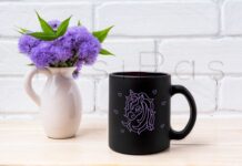 Black Coffee Mug Mockup with Blue Ageratum in Pitcher Poster 1