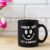 Black Coffee Mug Mockup with Magenta Tulip