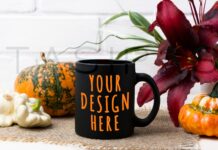 Black Coffee Mug Mockup with Pumpkin and Red Lily Poster 1
