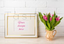 Gold Decorated Landscape Frame Mockup with Bright Pink Tulips in Golden Vase Poster 1