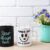 White and Black Mug Mockup with Cornflower and Daisy