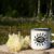 White Campfire Enamel Mug Mockup with White Flowers.