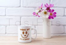 White Coffee Mug Mockup with White and Pink Daisy Poster 1