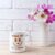 White Coffee Mug Mockup with White and Pink Daisy
