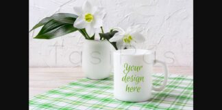 White Mug Mockup with Lily in Vase on Green Checkered Napkin Poster 1