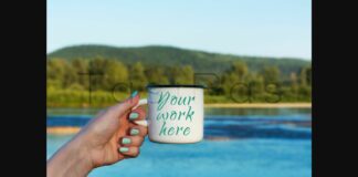 Woman Holding Enamel Mug with River View Poster 1